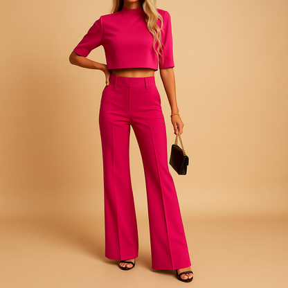 Women’s autumn two-piece set with cropped top and fitted pants, perfect for work, leisure, and stylish casual wear.