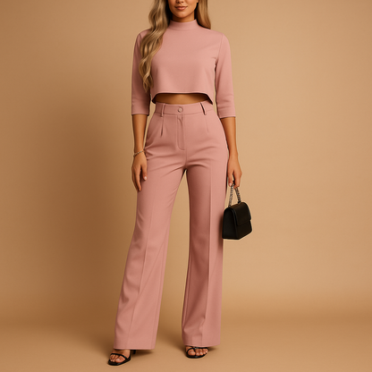 Women’s autumn two-piece set with cropped top and fitted pants, perfect for work, leisure, and stylish casual wear.